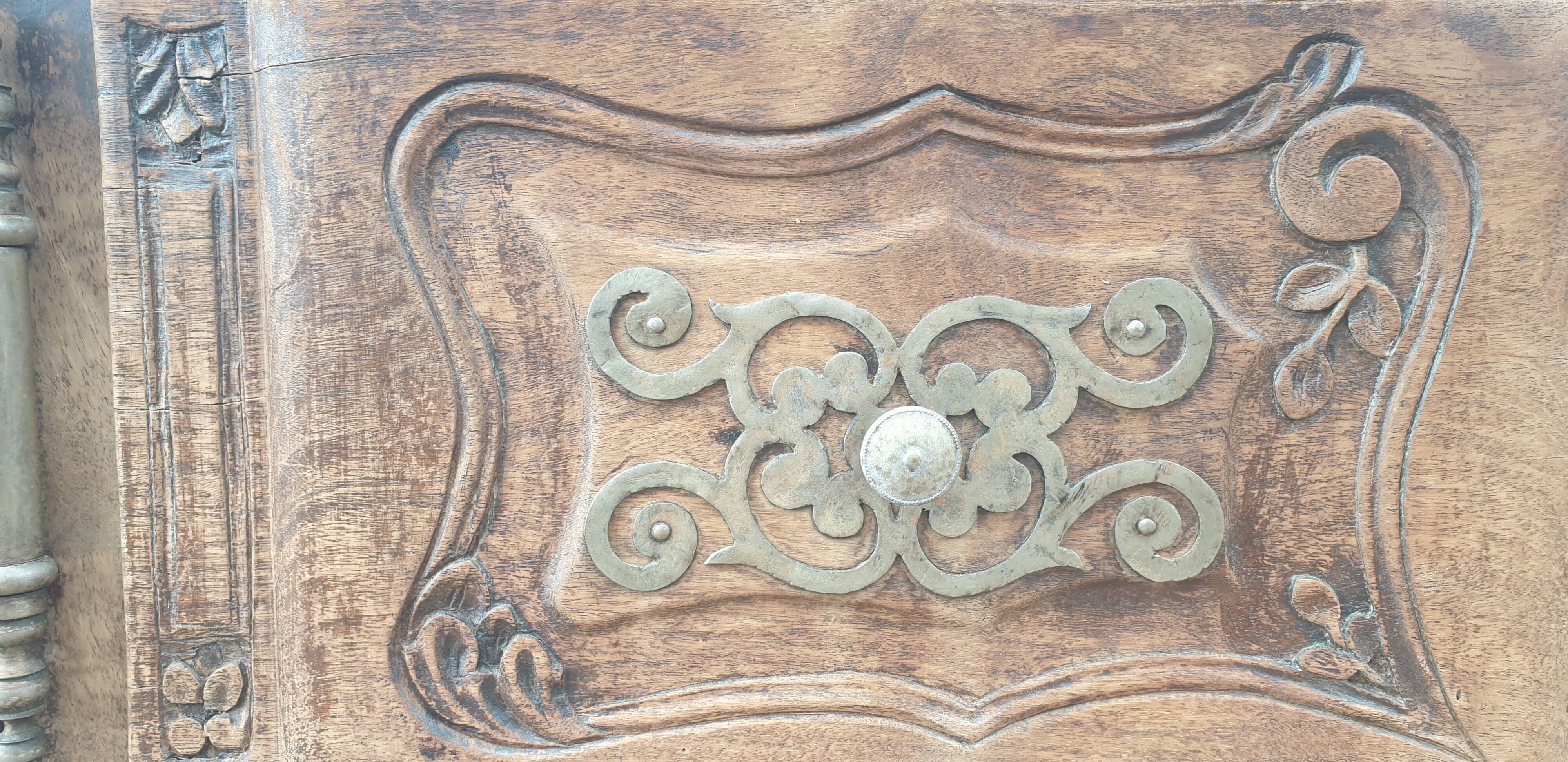 Provencal furniture in finely carved light walnut with wrought ironwork