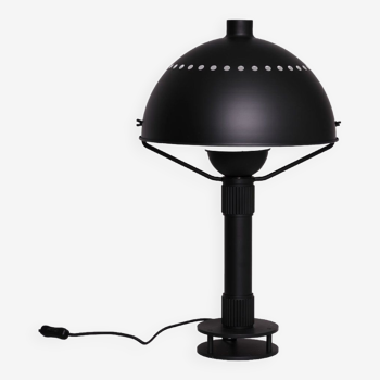 Matte black metal lamp signed by hand by its creator Marc Held