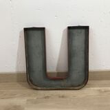 Old metal letter "U"
