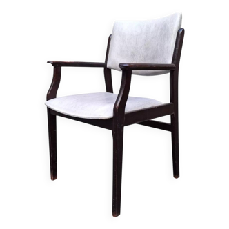 Wooden armchair and faux leather.