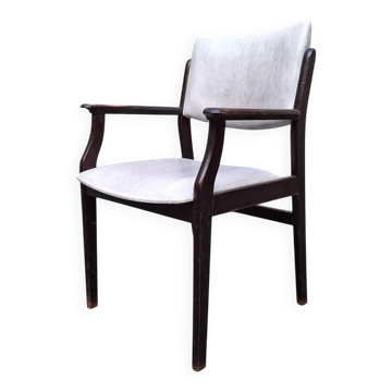 Wooden armchair and faux leather.