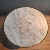 Gueridon circulaire dessu marbre blanc