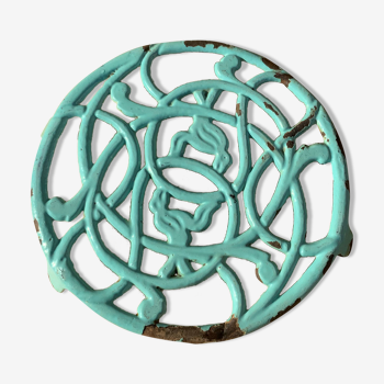 Old trivia in enamelled cast iron blue green carving birds round format