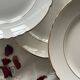 6 antique earthenware flat plates in off-white with gilding from Moulin des Loups.