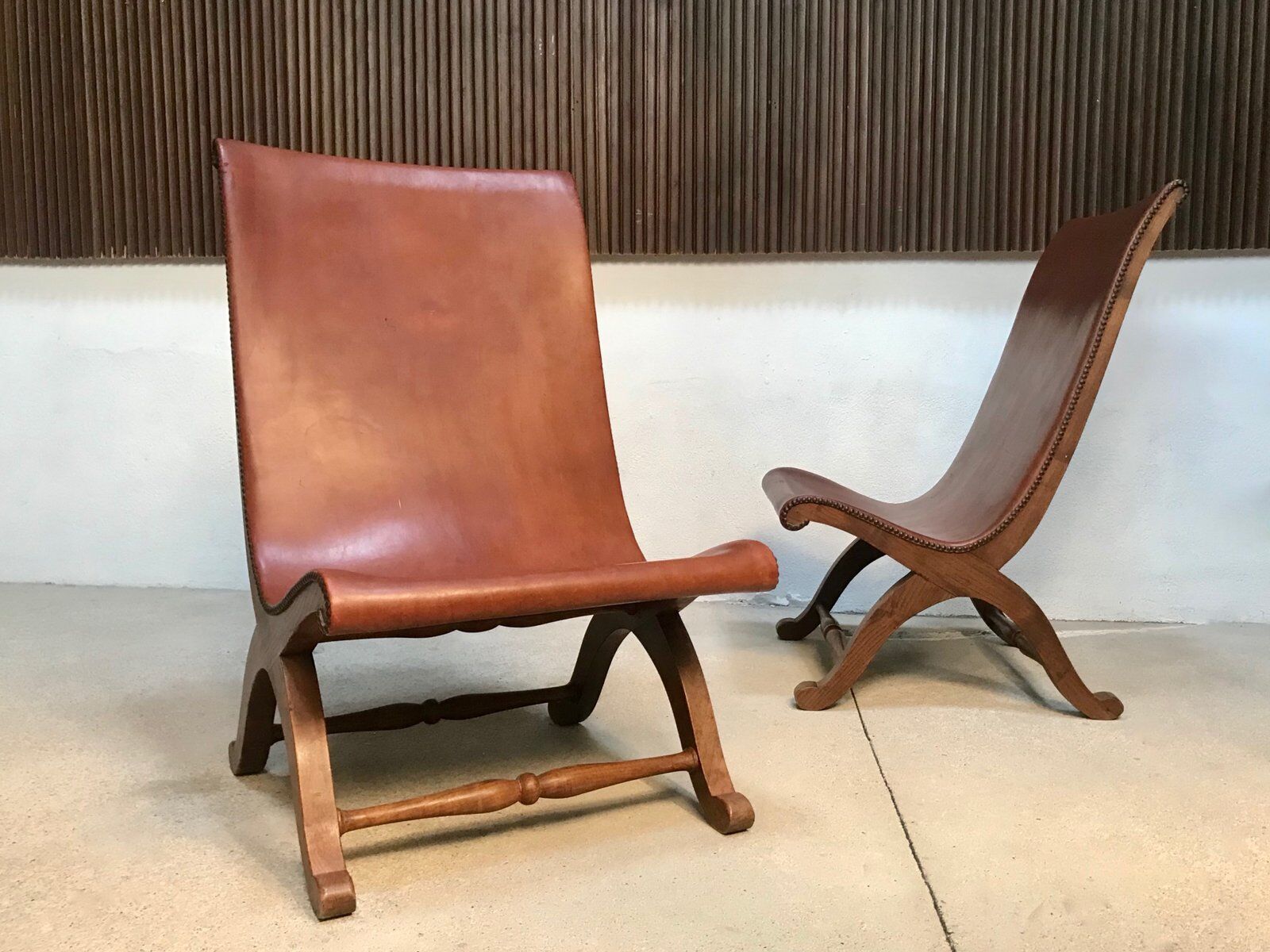 Set of 2 Spanish high-back leather slipper chairs by Pierre Lottier, 1950s