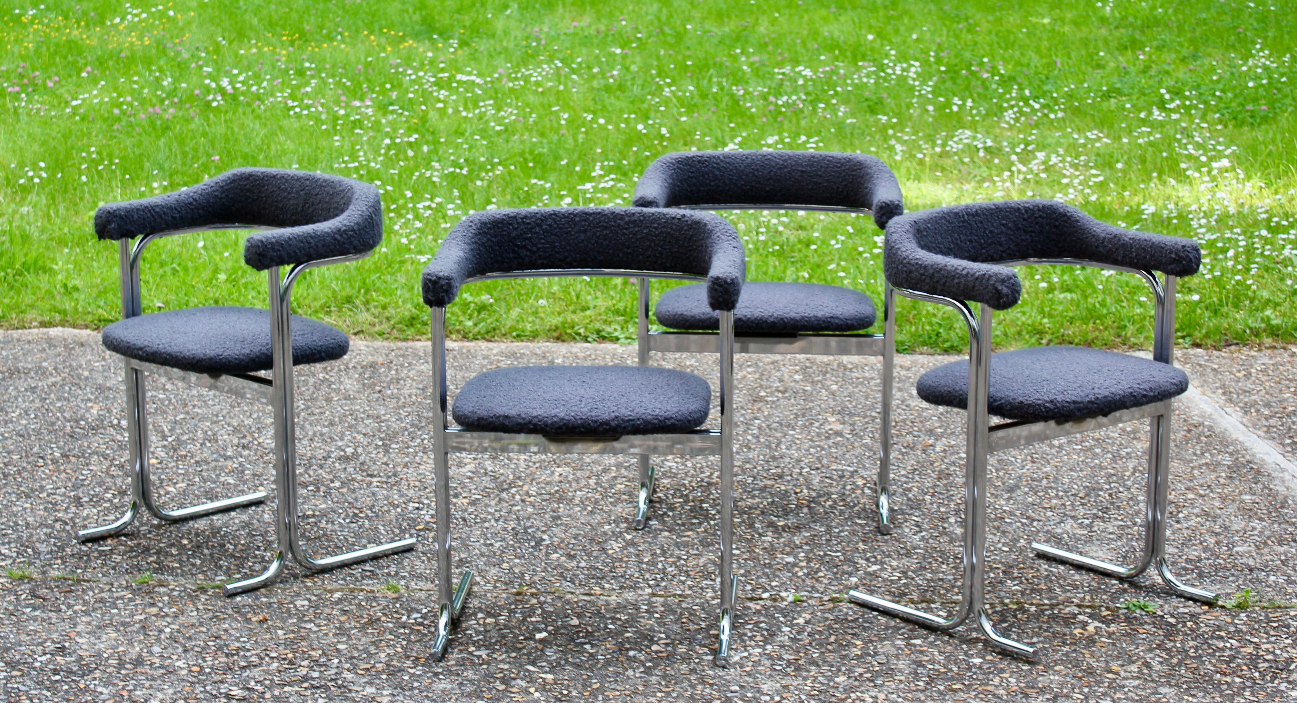 Set of 4 Space age chairs, chrome steel and buckle fabric
