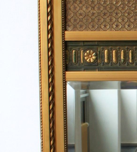Trumeau mirror with oval decoration and Louis XVI style pediment