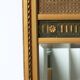 Trumeau mirror with oval decoration and Louis XVI style pediment