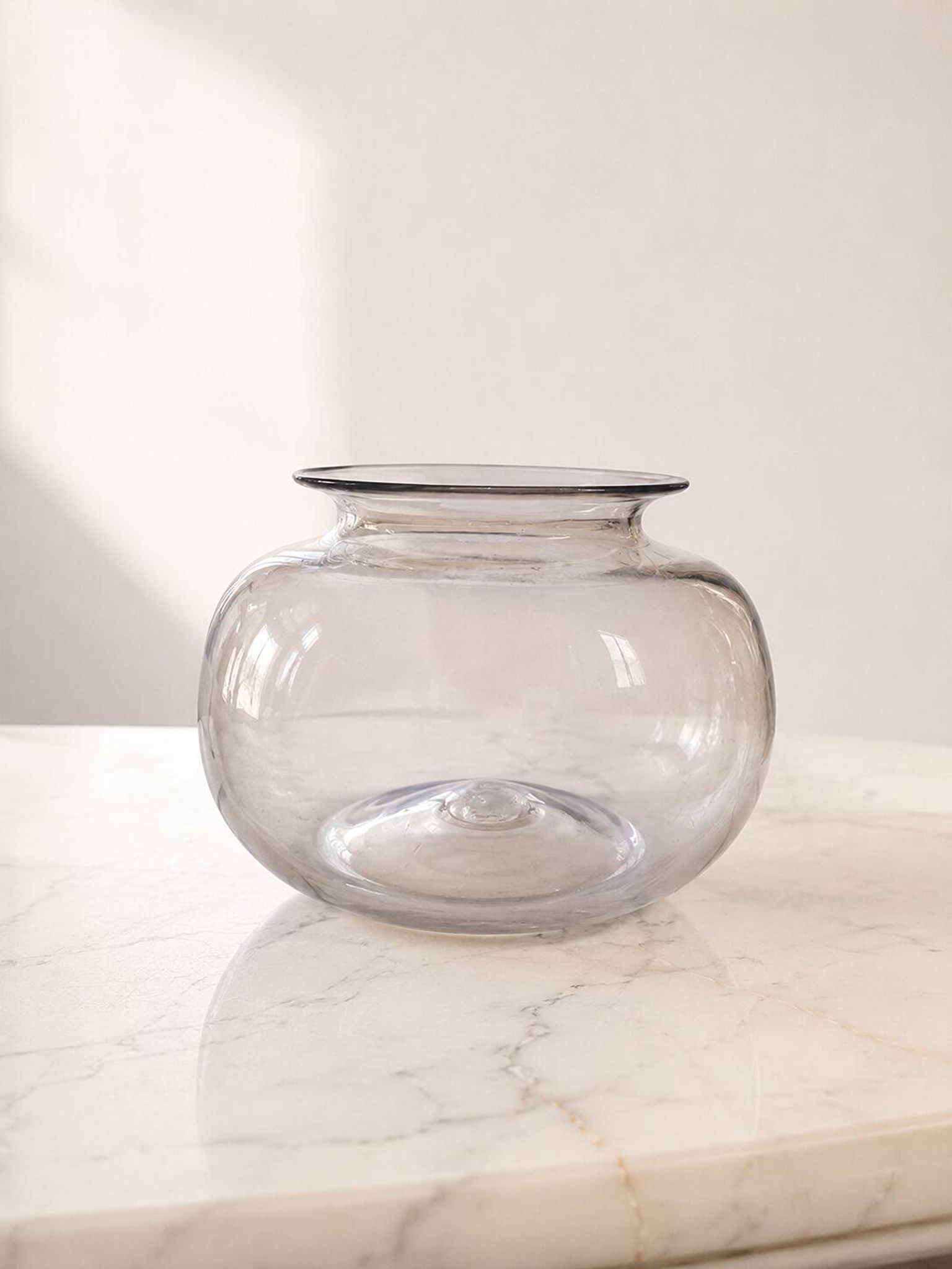 Round vase in Greco-Roman style in smoked glass
