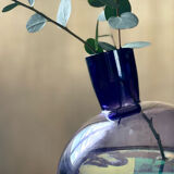 Purple vase inclined