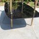 Glass and brass coffee table