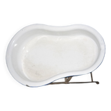 Enamelled bidet with folding support