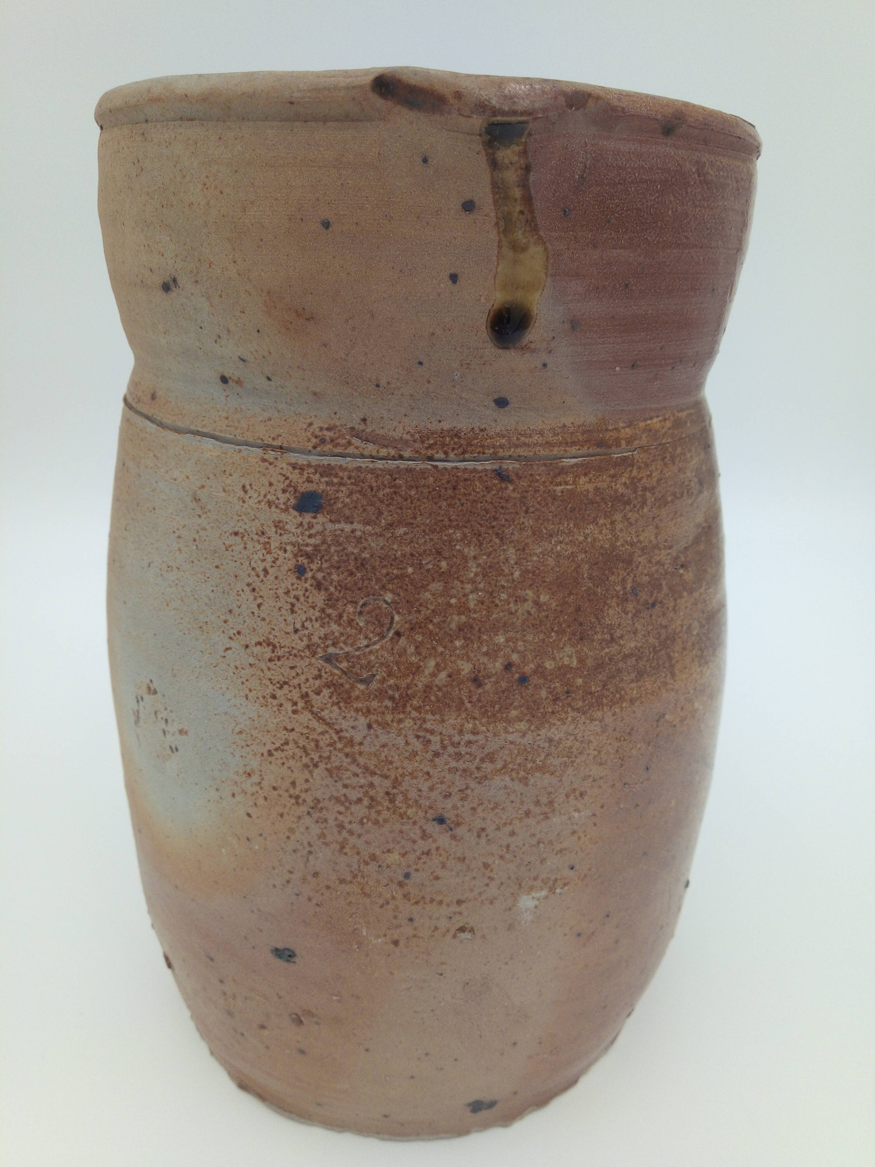 Pitcher in folk art sandstone
