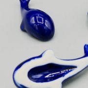 Set of 6 vintage blue porcelain whale knife rests.
