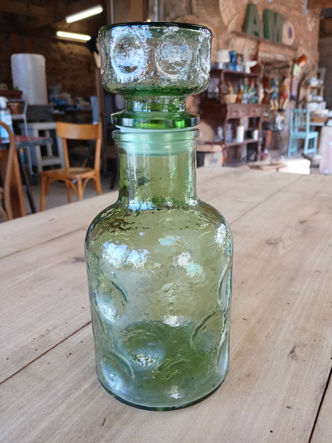 Antique green carafe