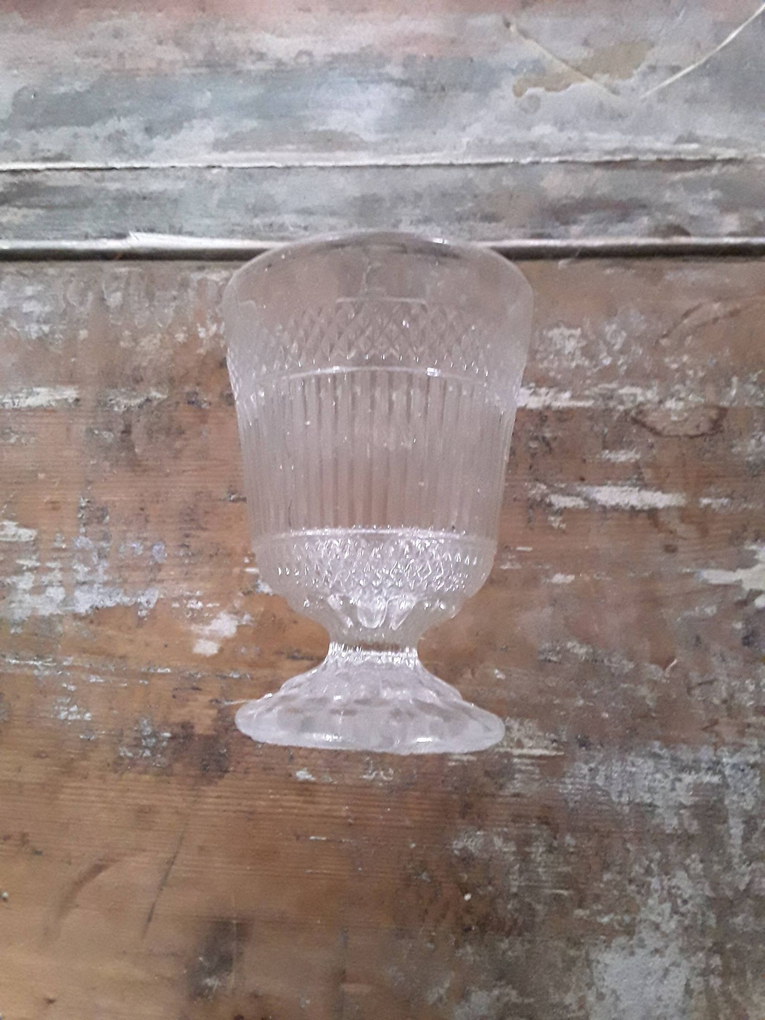 Antique glass with violets, 19th century.