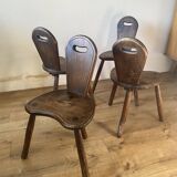 4 brutalist farm tripod chairs