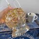 Set of two suspensions in gilded chiseled glass