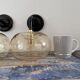 Pair of vintage electrified smoked glass wall lamps