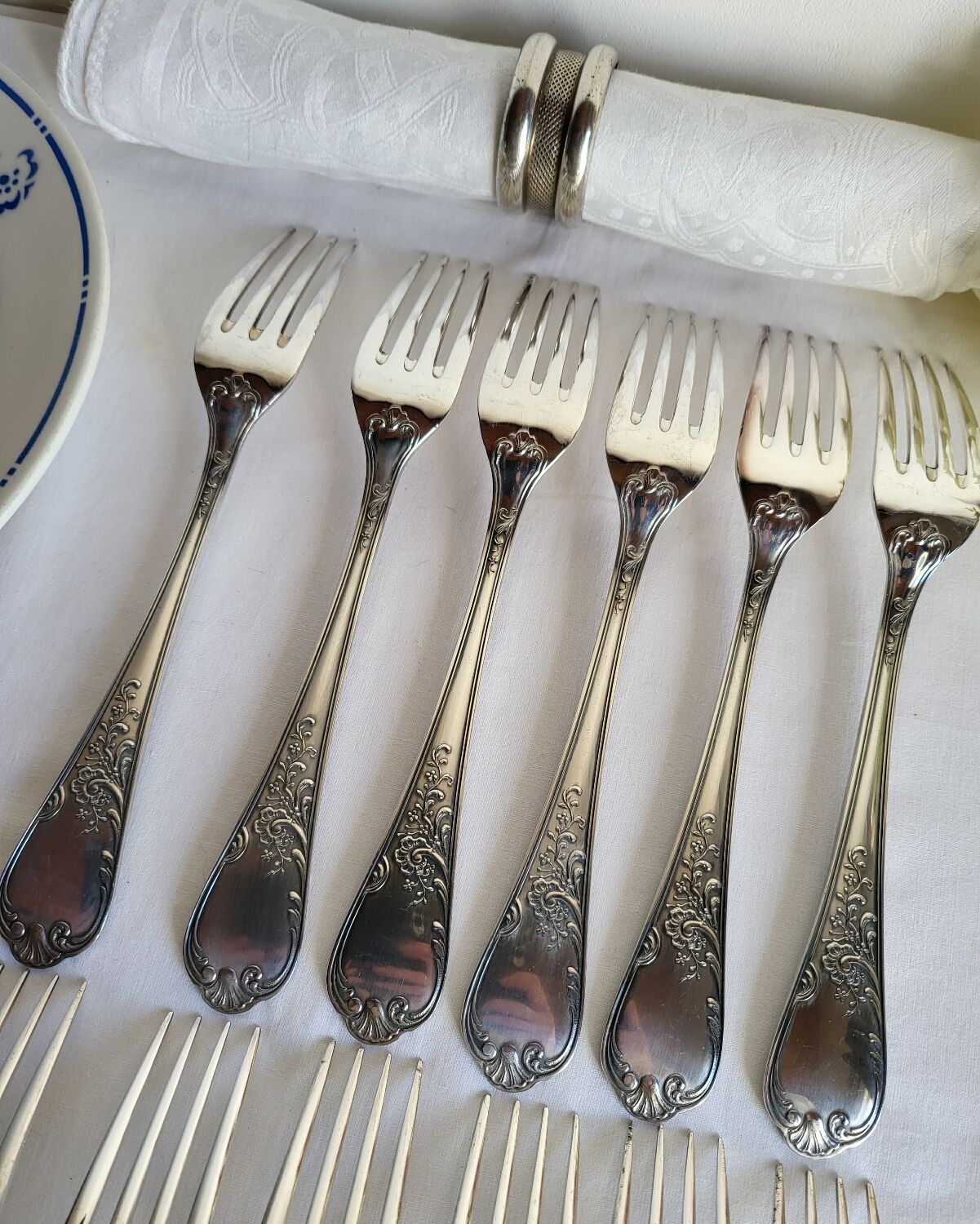 12 large silver-plated metal table forks by Guildart