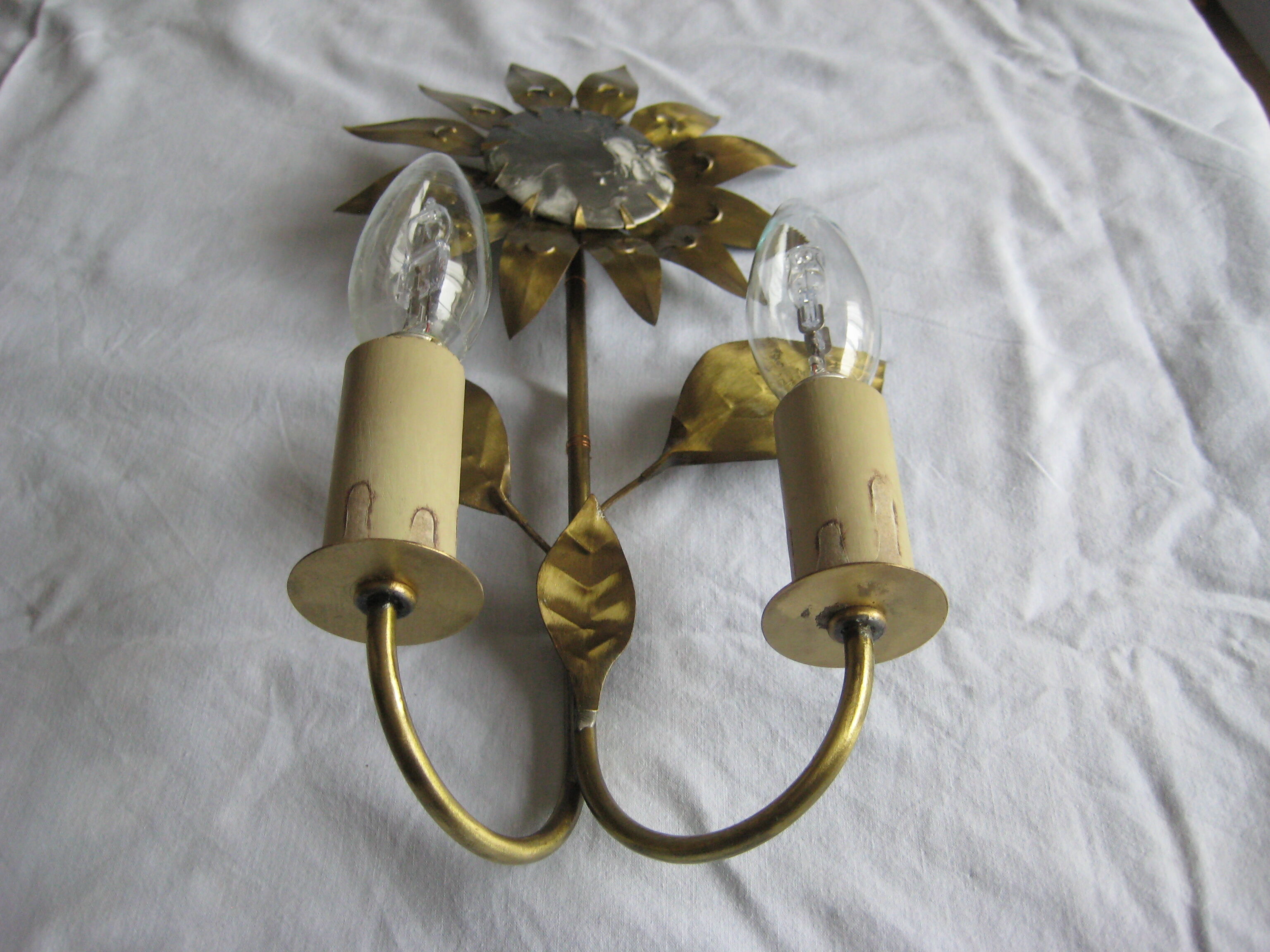 Brass sunflower sconces