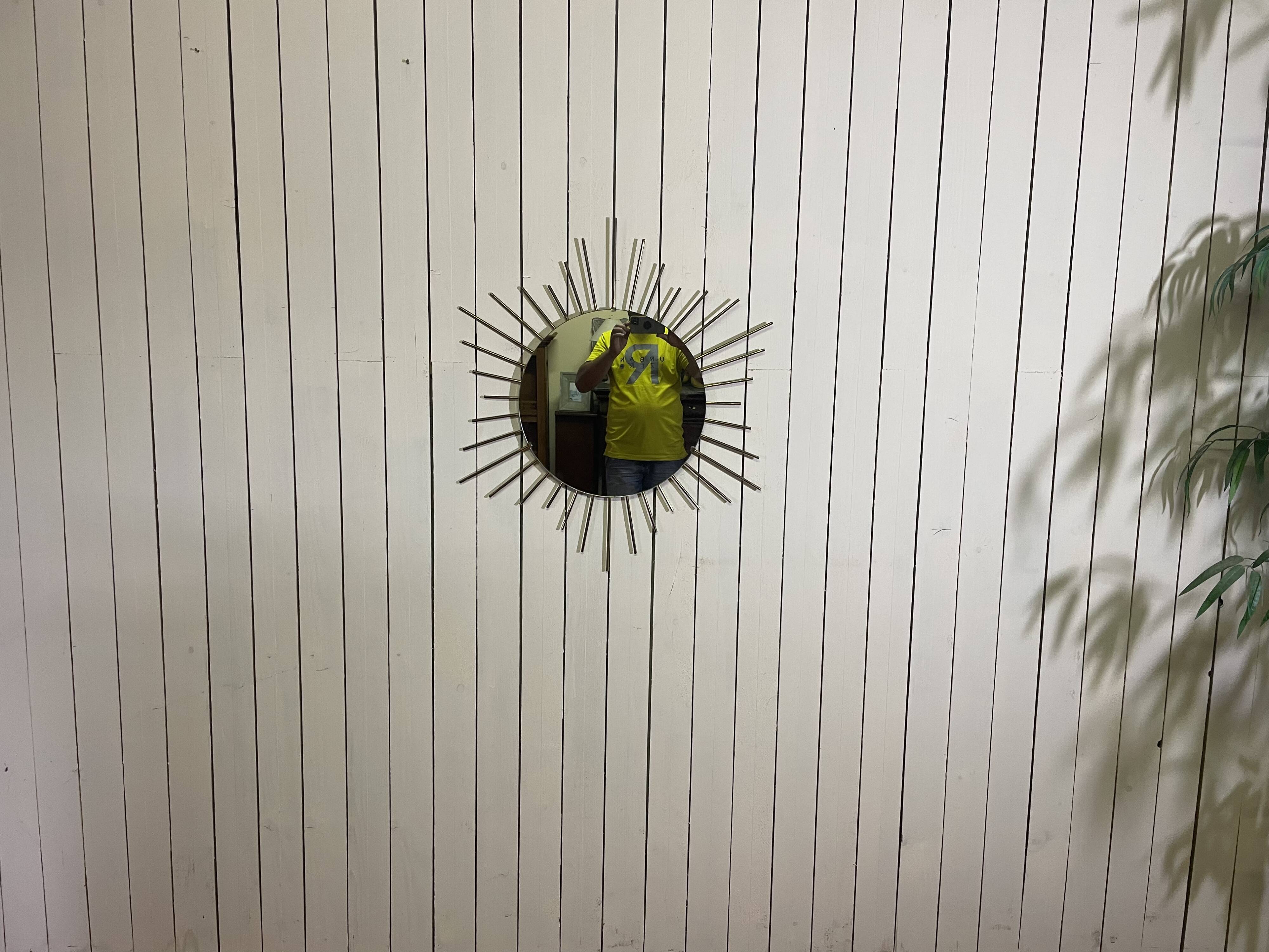 Golden metal sun mirror year 60