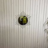 Golden metal sun mirror year 60
