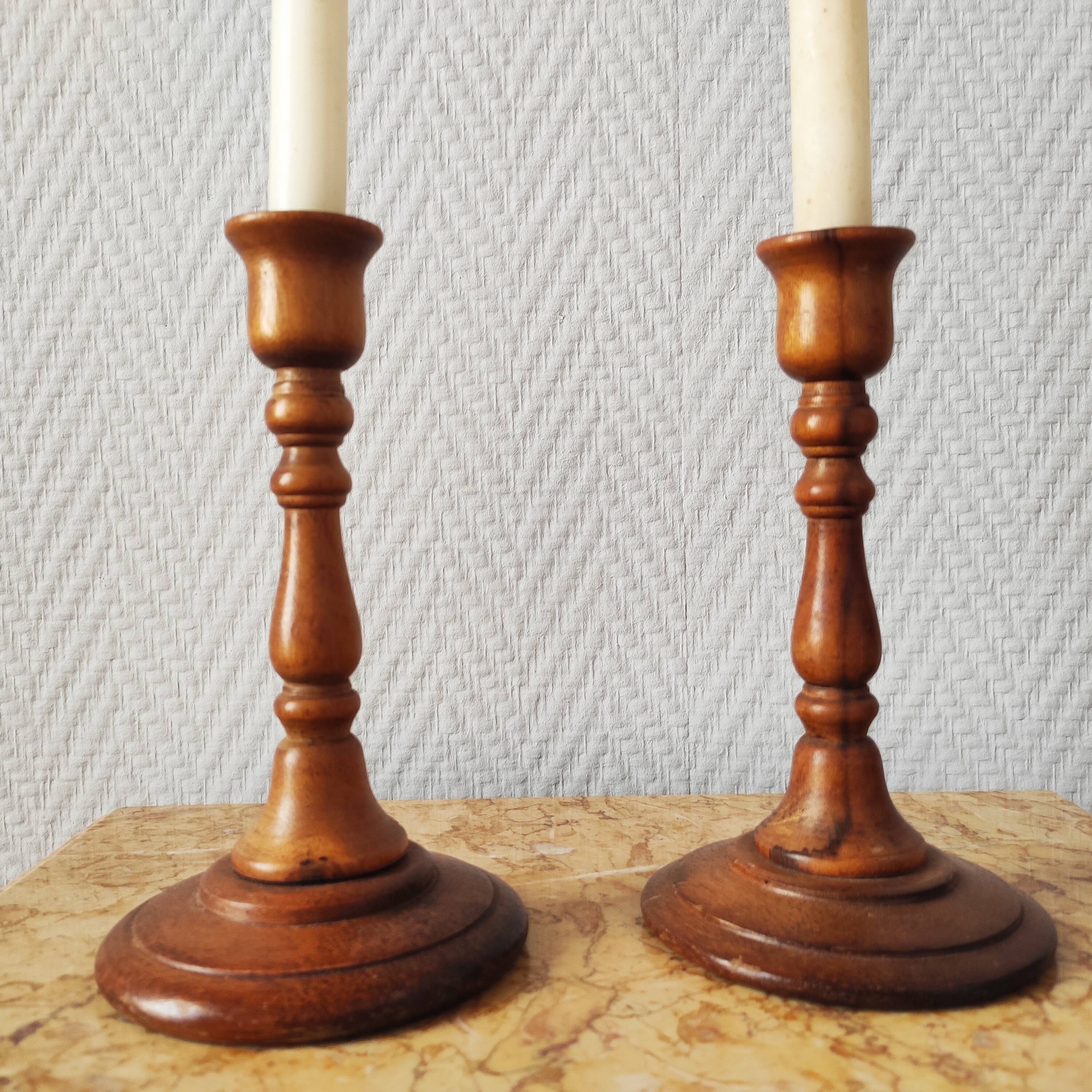 Pair of vintage turned wooden candlesticks