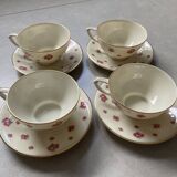 4 porcelain cups and saucers