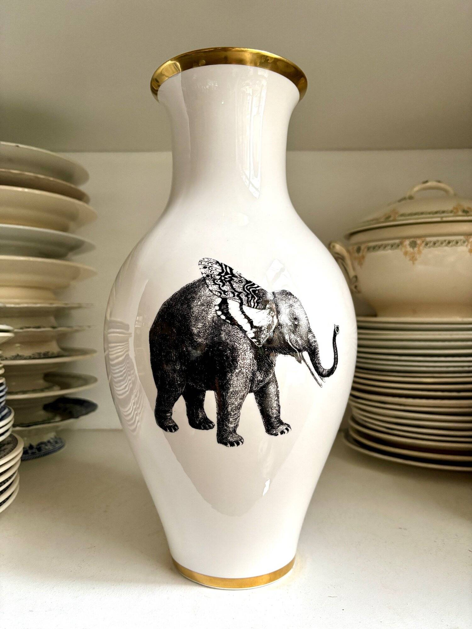 White and gold porcelain vase with black patterns by Mauricio Ortiz