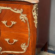 Louis XV style commode. Marquetry, gilded bronze decoration.