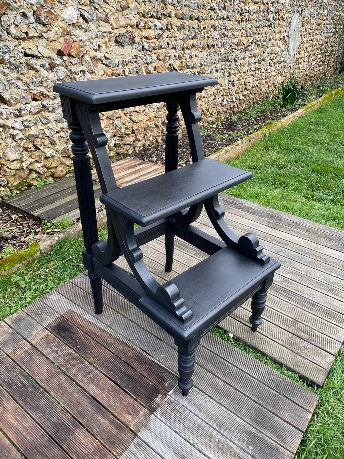 Old library stepladder in blackened wood