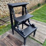 Old library stepladder in blackened wood