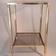 Gilded brass and smoked glass end table, 1960s.