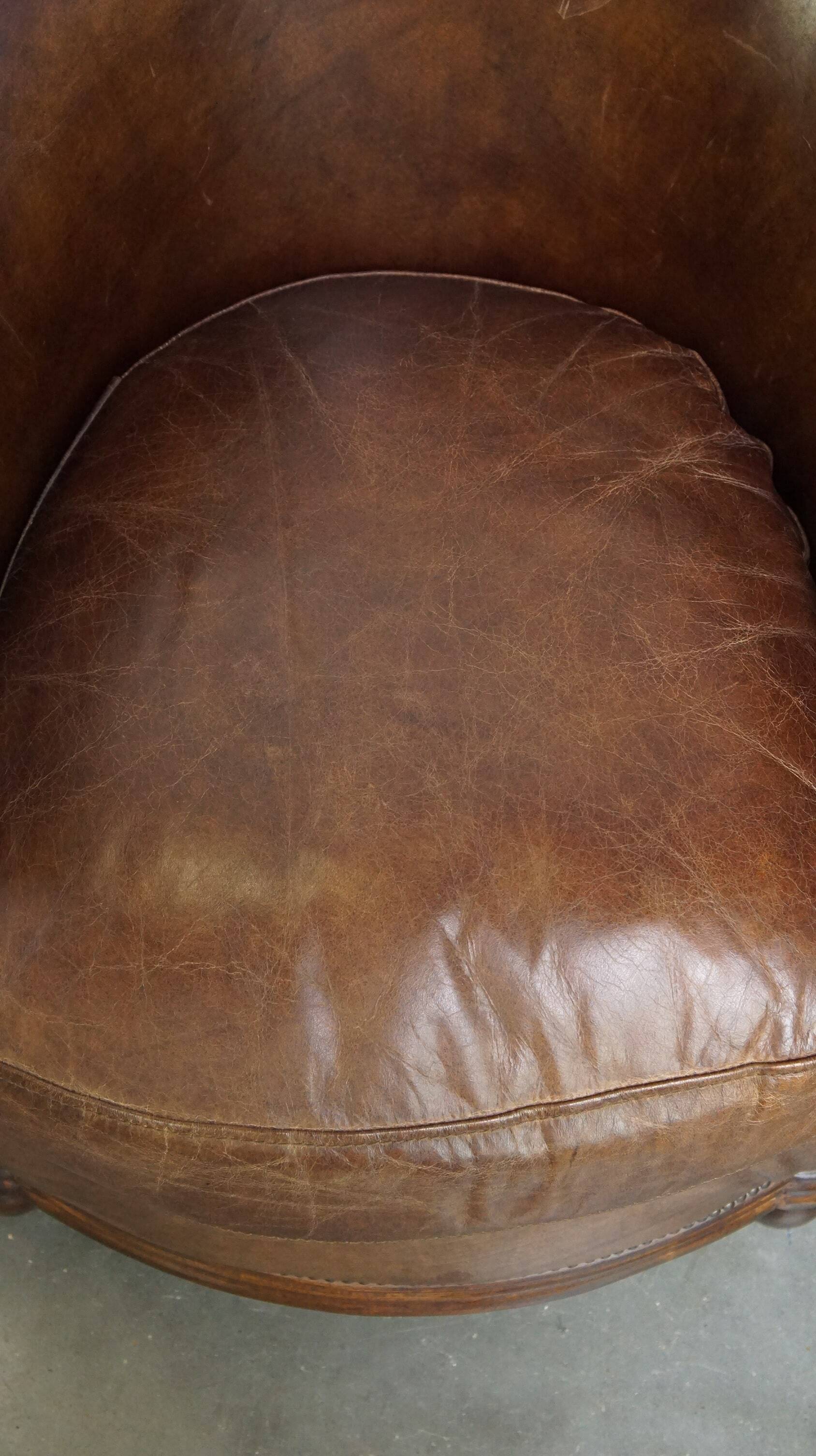 Set of 2 club chairs/armchairs in dark cognac leather