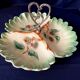 Beggar or servant in barbotine with fruit decoration heart handle