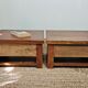 Pair of handcrafted walnut bedside tables from the 20th century.