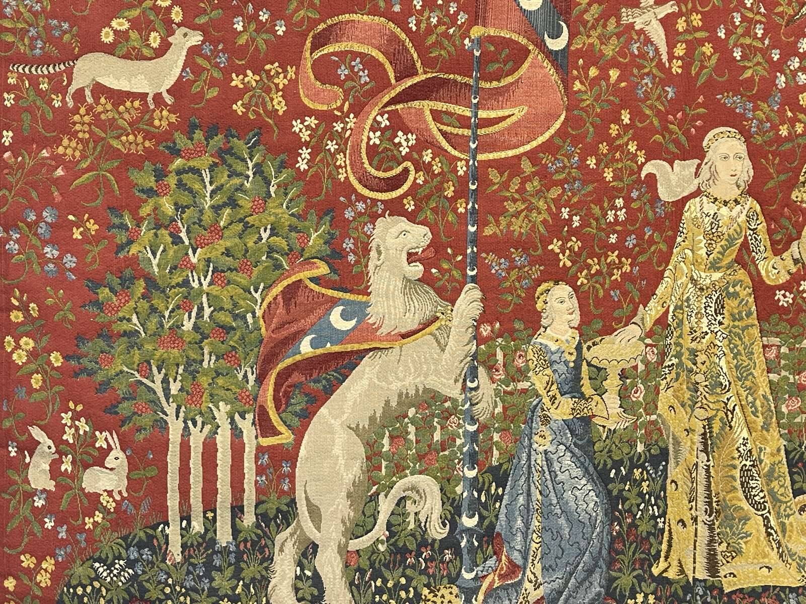 Medieval-style handmade tapestry, named Lady with the Unicorn.