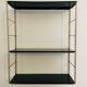 Adjustable vintage wall shelf in black metal and brass