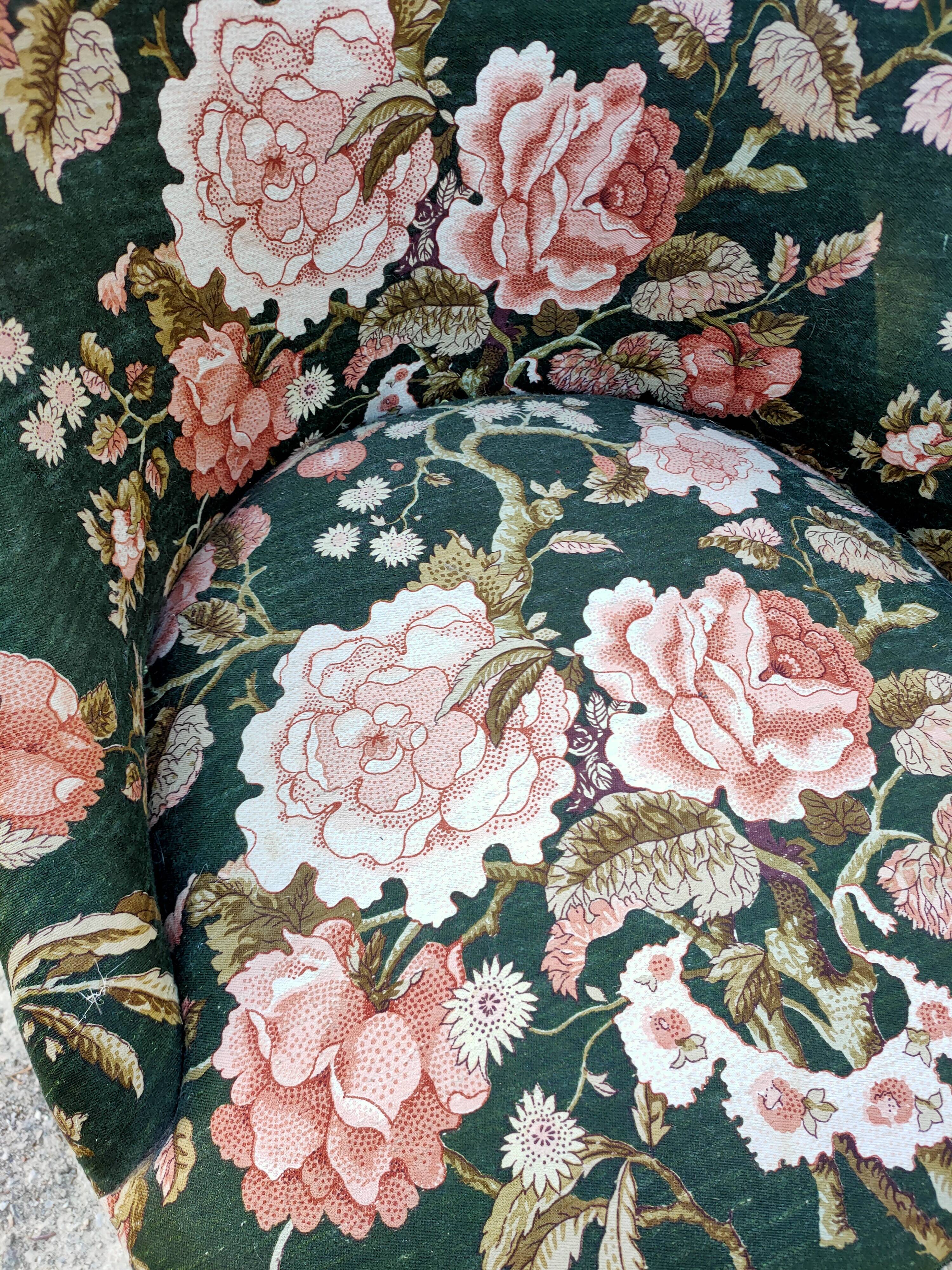 Two toad armchairs, floral motifs