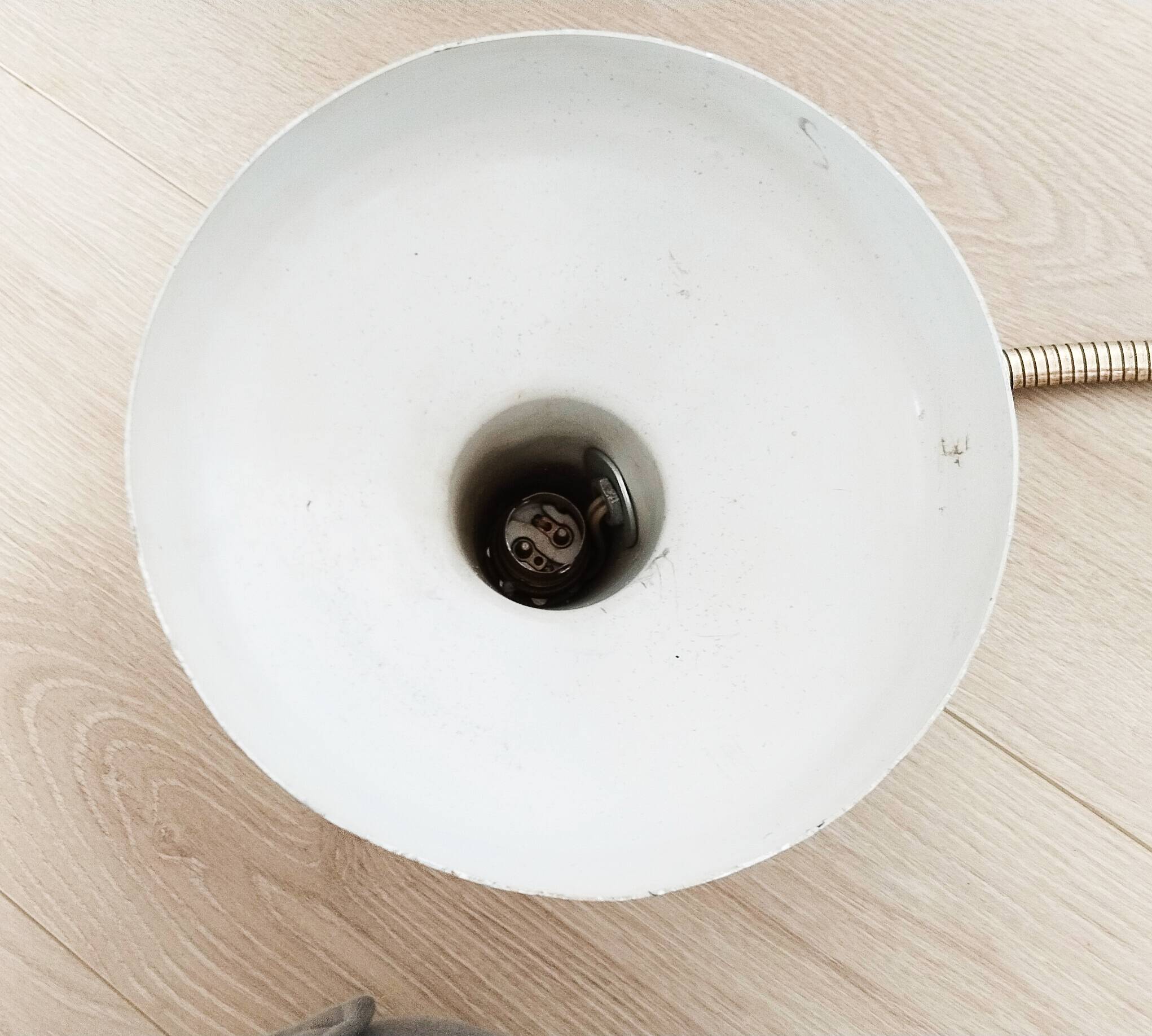 Green and gold articulated desk lamp