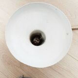 Green and gold articulated desk lamp