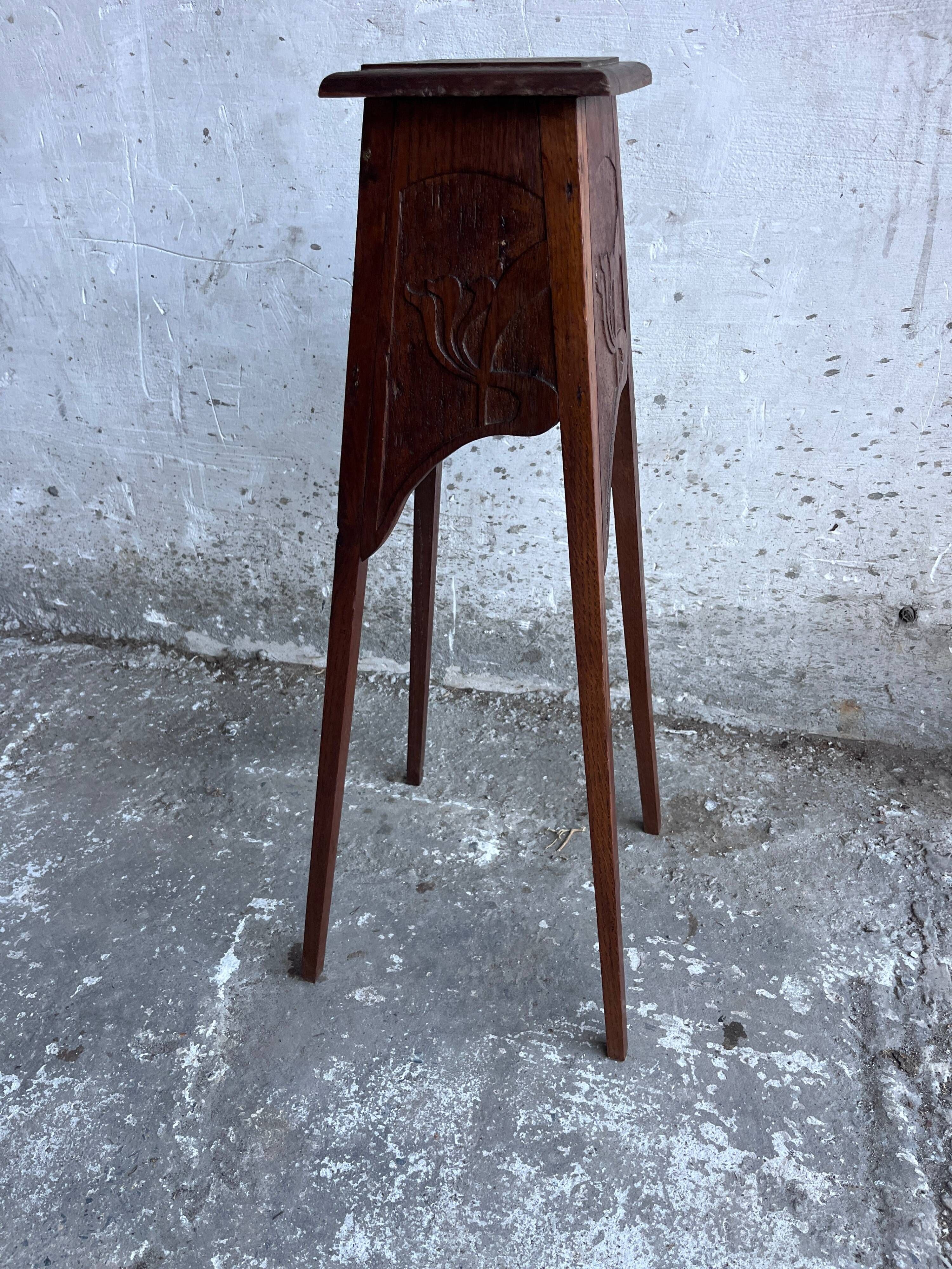 Sculpted wooden plant stand in Art Nouveau style, circa 1910.