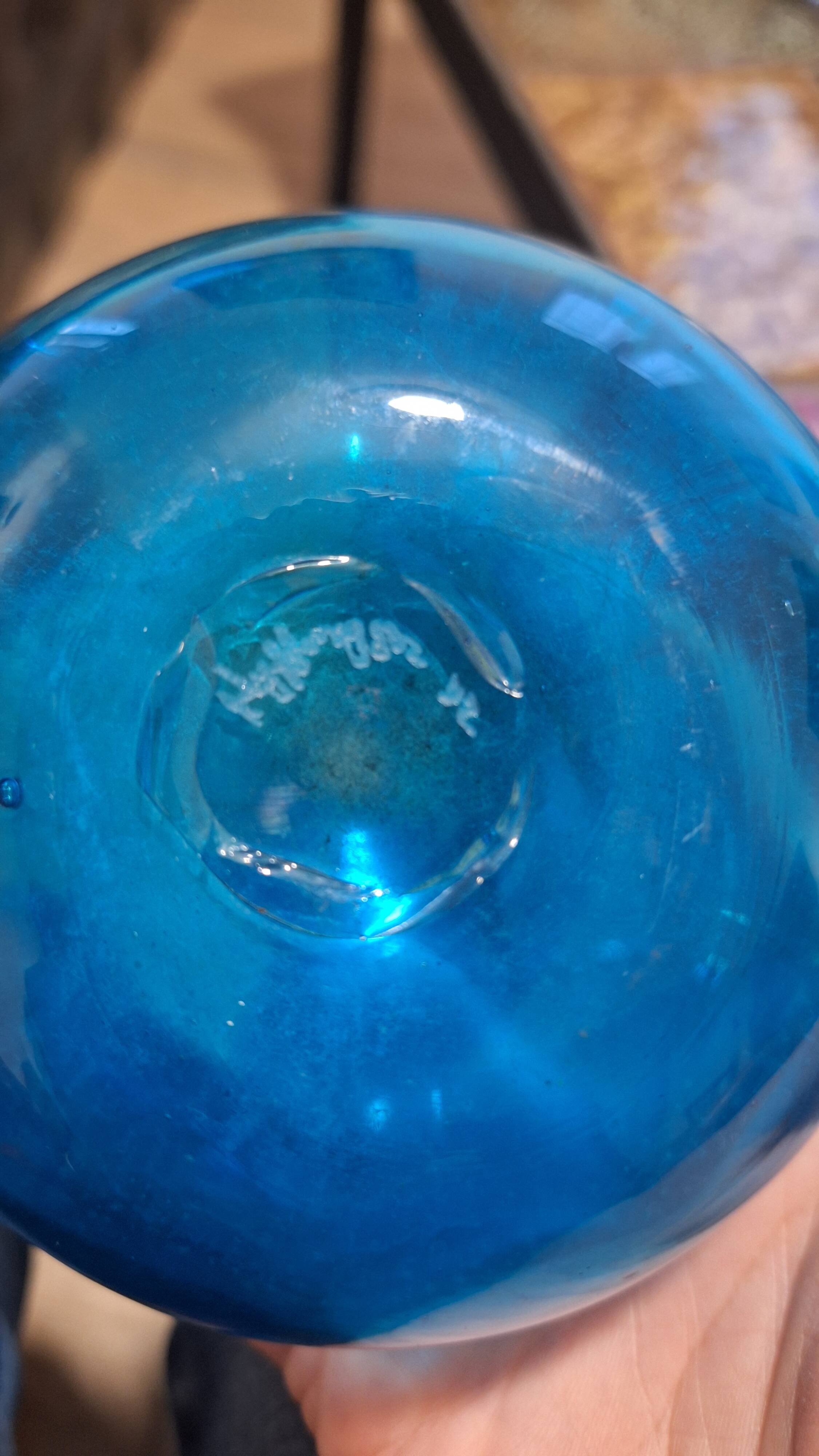 Turquoise blue blown glass vase