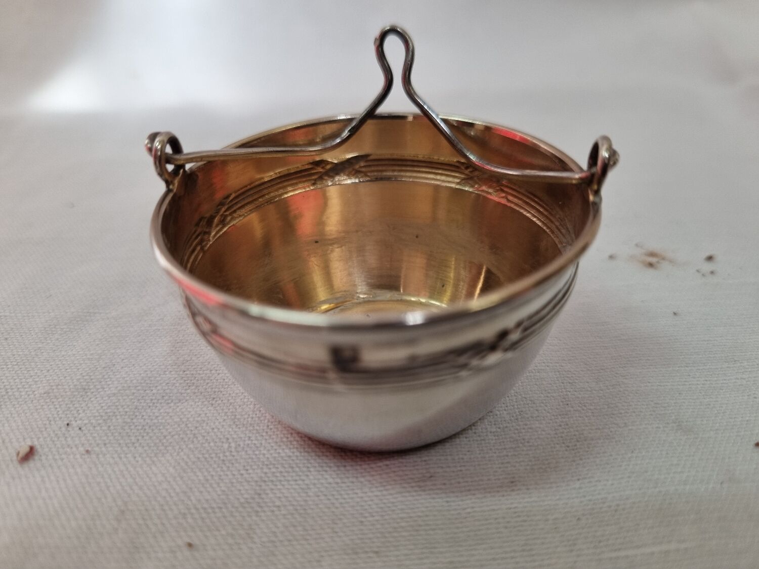 Tea strainer, solid silver, neck brace