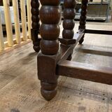 Wooden table with gateleg flaps