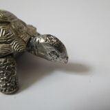 Small box in the shape of a silver metal turtle