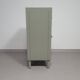 Gray metal locker. Industrial small sideboard.