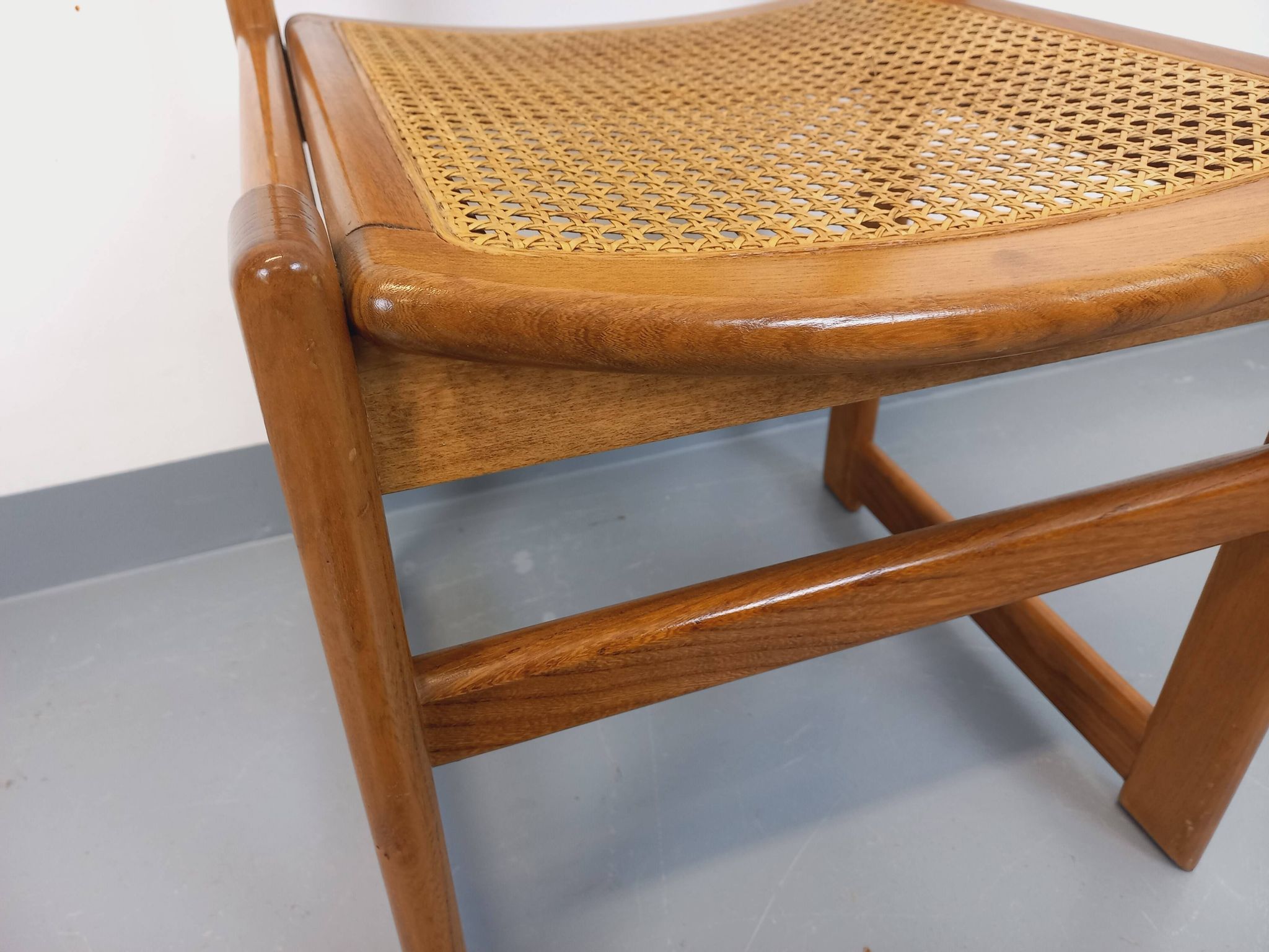 Vintage sleigh chair in beech wood and cane from the 70s and 80s