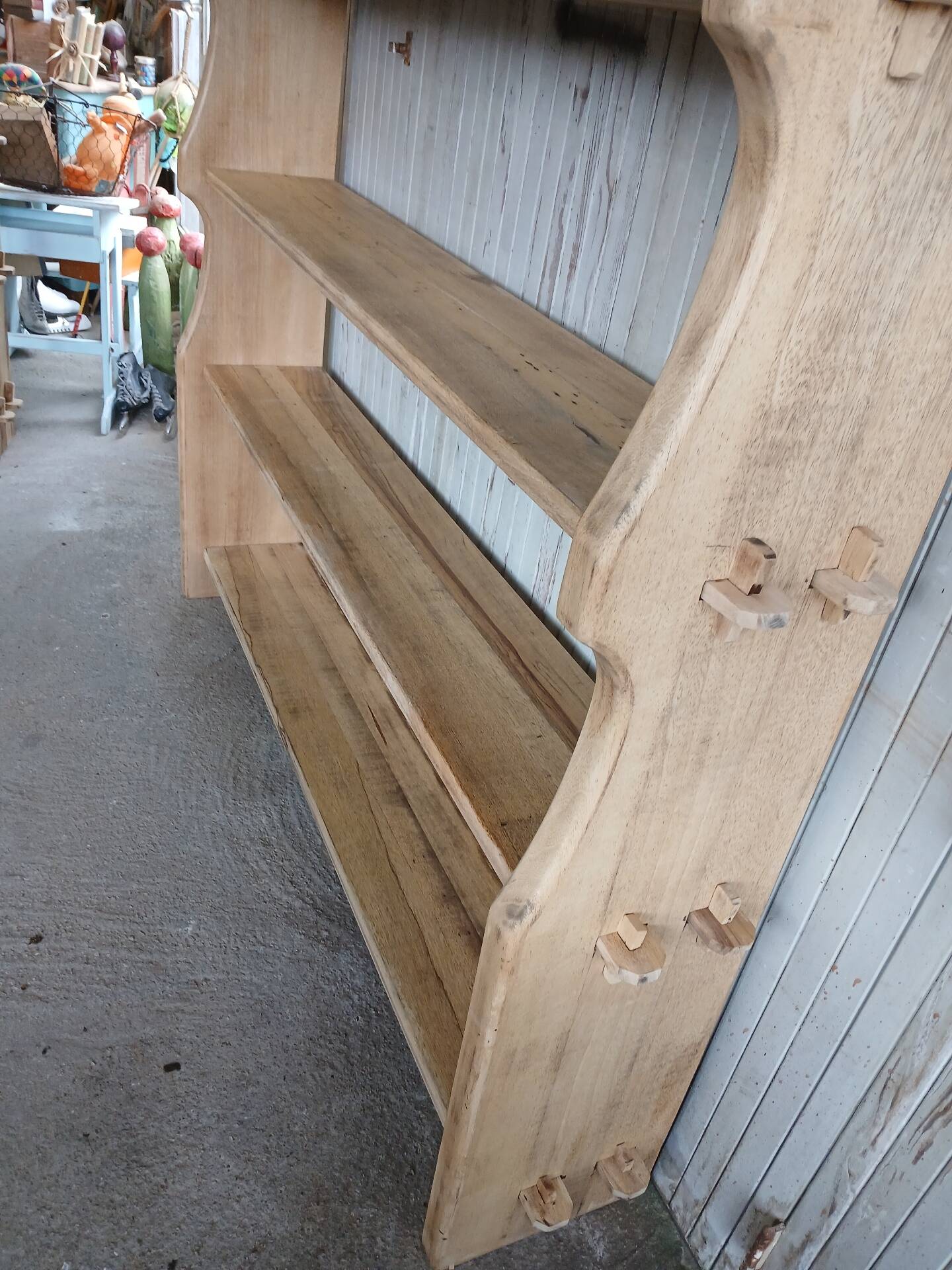 Solid wood shelf in brutalist style
